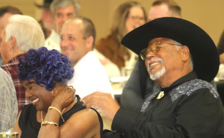 Ron and Gwendolyn Williams laugh during Thursday’s retirement celebration in honor of Ron Williams’ 43 years as a county commissioner. (TONY BRITT/Lake City Reporter)
