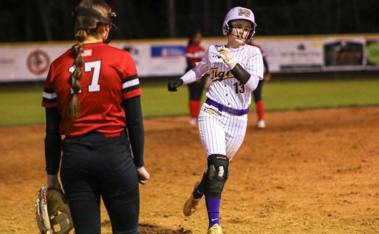 Columbia second baseman Anna Dansby rounds third base after Emily Delgado hit a home run against Baker County on Thursday night. (BRENT KUYKENDALL/Lake City Reporter)