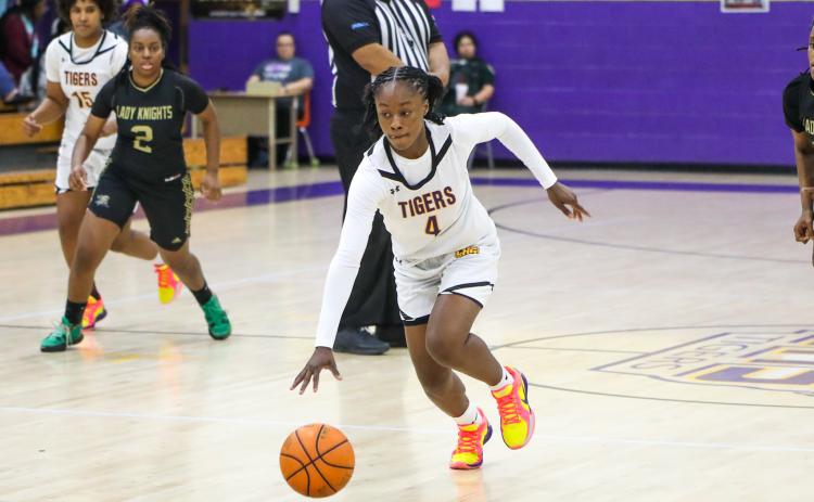 Columbia guard Eriel Baker dribbles up the court on a fast break against Oakleaf on Jan. 29. (BRENT KUYKENDALL/Lake City Reporter)