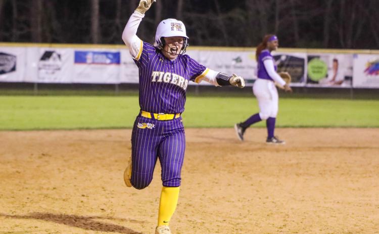 Columbia third baseman Alex Collins celebrates rounding third base after hitting a walk-off home run against Gainesville on Tuesday. (BRENT KUYKENDALL/Lake City Reporter)