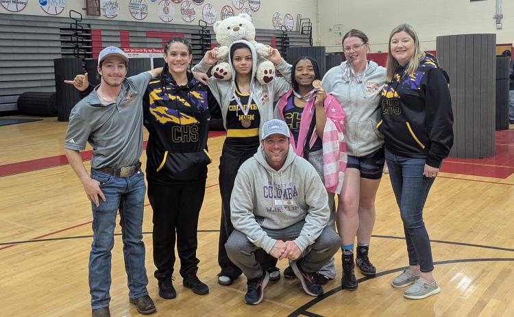 Columbia wrestlers Carlee Morrison, Bella Guerrier-Lajoir, Ja'Niyah Williams and Josie Raulerson qualified for the state meet following their top-four performances at the Region 1-1A IBT on Saturday. (COURTESY)