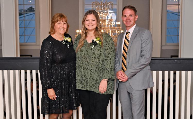 Summers Elementary’s VPK program earned a perfect score for the second straight year on the Classroom Scoring System (CLASS). The program is led by VPK teacher Karen McDonald (left) and assistant Kelsie Rodriguez (middle), who are pictured at the Columbia County Schools Teacher of the Year banquet in November with Summers Principal Robert Cooper. (COURTESY COLUMBIA COUNTY SCHOOLS)