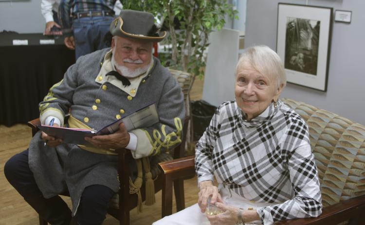 Blue Grey Army Commanding General Tony Buzzella and Executive Director Faye Bowling Warren enjoy a break at the Olustee Festival sponsor reception. (TONY BRITT/Lake City Reporter)