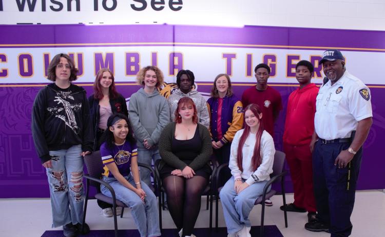 Golden Voice contestants Jaleiah Burch (front row, from left), Hailey Cross and Aleah Rogers; Asher Watson (back row, from left), Catherine Ward, Nolan Peloni, Micah Williams, Laila Striebel, Michael Goodbread, Damieon Jernigan stand with competition founder Ronnie Collins. Not pictured are contestants Caroline Sawyer and Elora Rodgers. (COURTESY)
