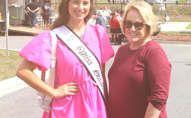Miss Olustee Layla Merola, a Suwannee High senior, smiles with Patti Aldous of the Miss Olustee pageant during Friday’s opening of the Olustee Festival. (TONY BRITT/Lake City Reporter)
