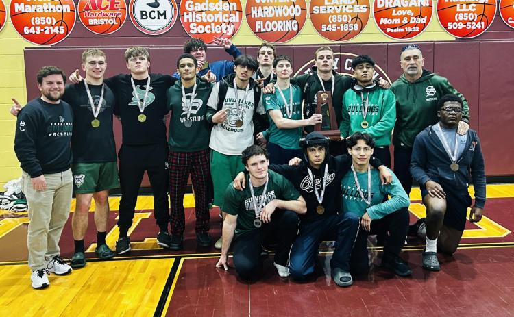Suwannee’s wrestling team won their third straight district IBT title on Tuesday, taking home the 2-1A crown. (COURTESY)