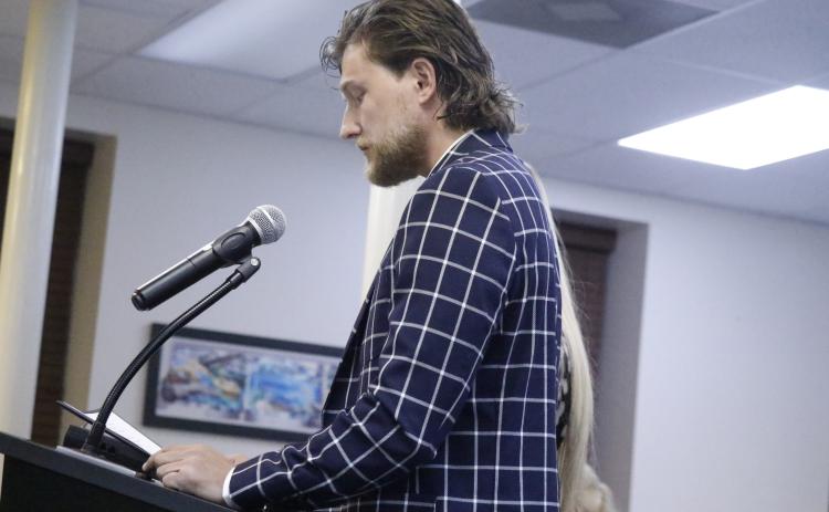 Cameron Myers with Fox Lagoon speaks to the Lake City Council about his proposal to turn city-owned property into a ‘high-end’ tourist development. The council later authorized a study on the property to be used for its wastewater system instead of that project and a potential housing development. (JAMIE WACHTER/Lake City Reporter)