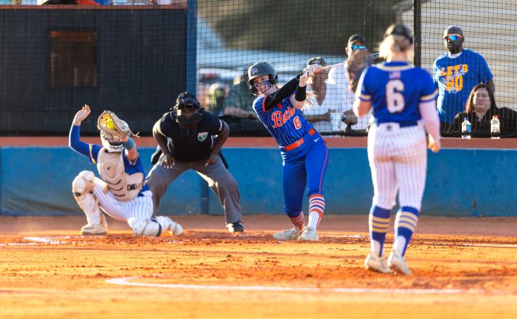 Branford third baseman Madyson Sikes swings through a pitch from Crystal River pitcher Violet Flynn on Tuesday. (JACK HOWDESHELL/Lake City Reporter)