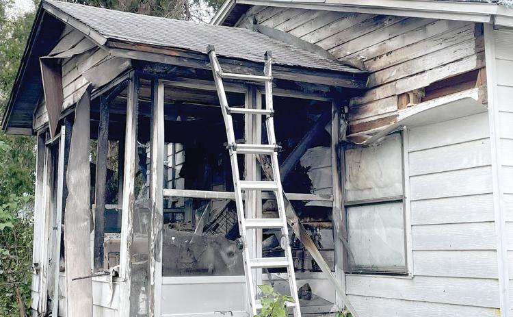 A fire burned the back porch of a residence on SE St. Margaret Drive on Thursday. The home owner was not injured by two dogs did die in the fire. (COURTESY LAKE CITY FIRE DEPARTMENT)