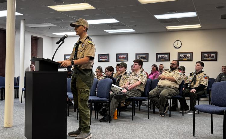Dakota Beichner, a senior patrol leader with Scouts Troop 85, speaks to the Lake City Council on Monday night. The troop attended the meeting as it works on its citizenship in the community merit badge. (JAMIE WACHTER/Lake City Reporter)