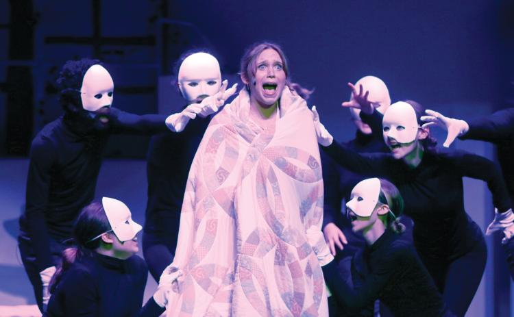 Betsy Peterson, portraying Sophie, reacts during a nightmare from Mamma Mia! The Suwannee High Theatre Troupe is performing the musical Thursday and Saturday at the SHS auditorium. (JAMIE WACHTER/Lake City Reporter)