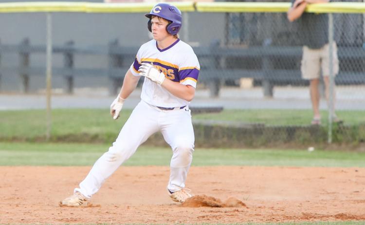 Columbia shortstop Trayce McKenzie turns off first base after a base hit against Flagler Palm Coast on April 4. (BRENT KUYKENDALL/Lake City Reporter)