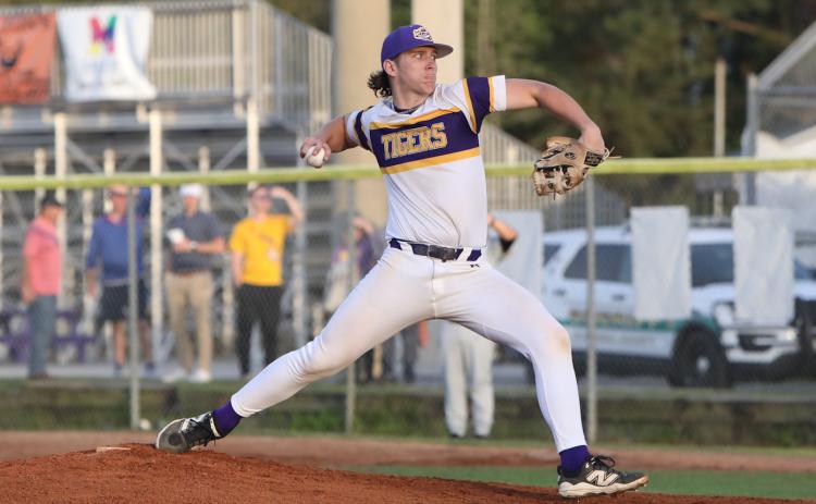 Columbia pitcher Ayden Phillips pitches against Buchholz on March 14. (BRENT KUYKENDALL/Lake City Reporter)