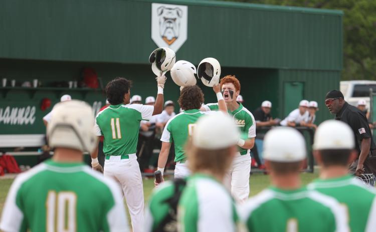 Suwannee right fielder Kyler Watson celebrates with teammates Gabe Garcia (11) and Jace Moran (9) after hitting a three-run home run against Baldwin in Game 1 of the Region 1-3A quarterfinals on Monday. (PAUL BUCHANAN/Lake City Reporter)