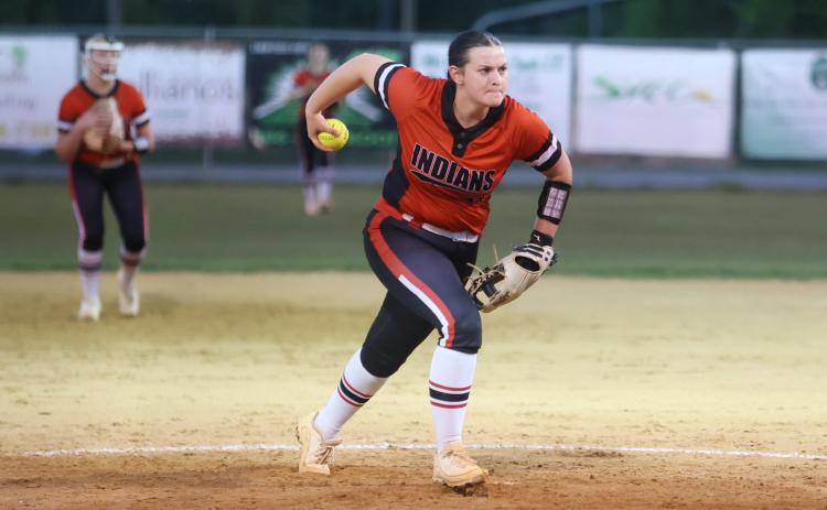 Fort White pitcher Kadence Compton winds up to pitch against Suwannee on April 4. (PAUL BUCHANAN/Lake City Reporter)