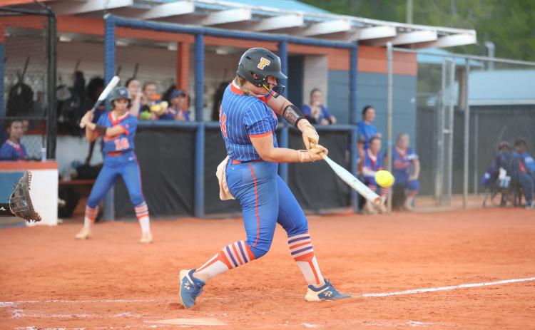 Branford's Victoria Swain makes contact with a pitch against Crystal River on March 18. (PAUL BUCHANAN/Lake City Reporter)