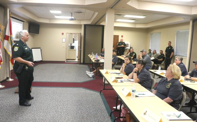 Columbia County Chief Deputy Katina Dicks (left) answers a question from a participant during the inaugural Citizen’s Academy. (FILE)