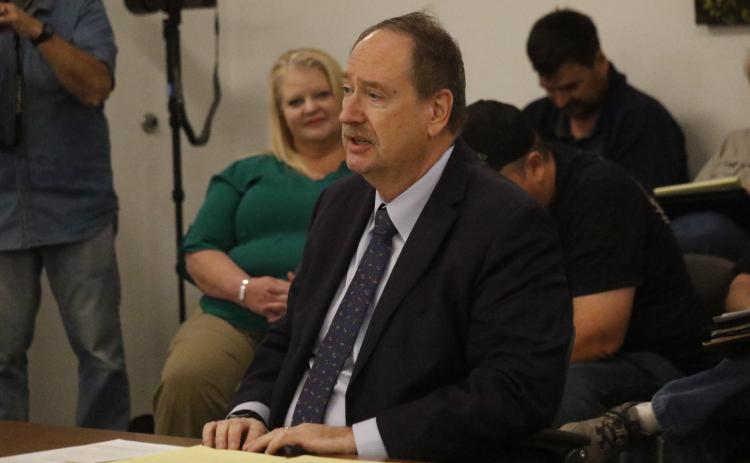 Former Lake City Manager Joe Helfenberger answers a question during Tuesday’s North Florida Water Utilities Authority meeting. (JAMIE WACHTER/Lake City Reporter)