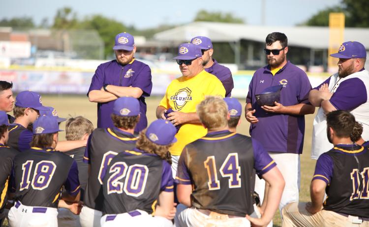 Columbia coach Chris Howard speaks to his team following the Tigers' sweep over Mosley in the Region 1-5A quarterfinals on April 24. (BRENT KUYKENDALL/Lake City Reporter)