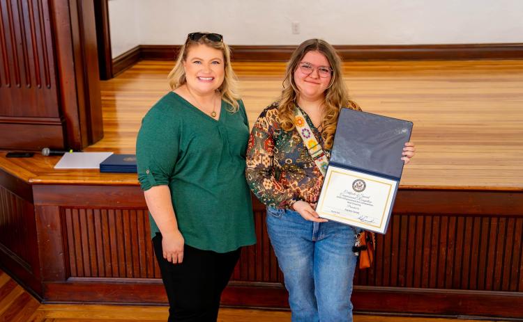 Branford sophomore Jayden Jones won first place in the drawing category of the Congressional Art Contest for Florida’s Third District. Jones is pictured with Congresswoman Kat Cammack. (COURTESY)