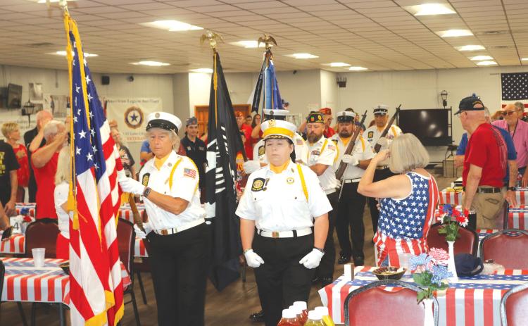 The American Legion Post 57 honor guard presents the colors during the organization’s Memorial Day ceremony on Monday. (TONY BRITT/Lake City Reporter)
