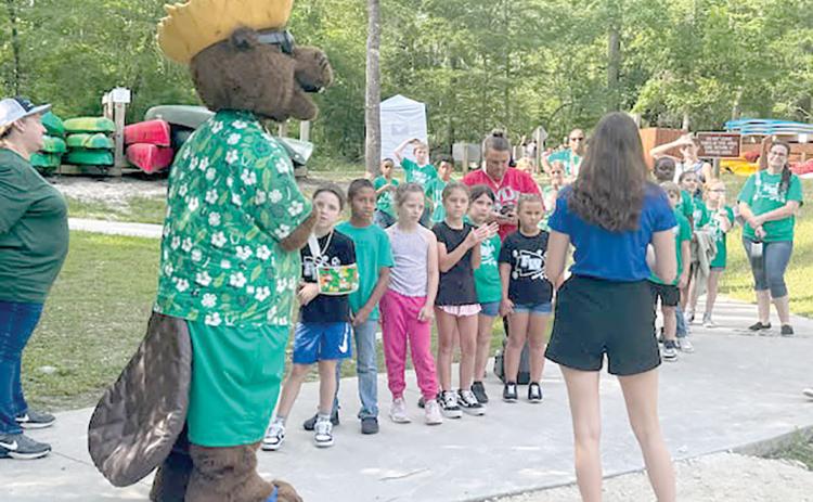 Bellamy the Beaver hosted a water celebration at Ichetucknee Springs State Park recently where students conservation and hands-on science. (COURTESY)