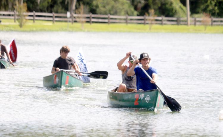 Brock and William Dees, the winners of the inaugural DeSoto Derby Canoe Race last year, lead down the home stretch. (FILE)