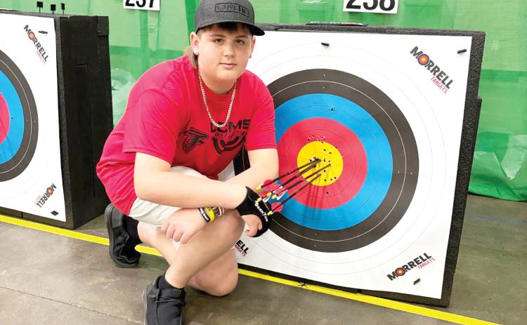 Lake City Middle School’s Chase Bryant is pictured at the Eastern National Archers in Schools Program tournament in Kentucky in early May. Bryant qualified for the NASP World Tournament. (COURTESY)