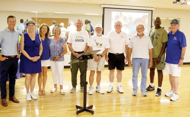 Lake City Columbia Community Tennis Association members and guests who have a tremendously positive influence on the program and its development, pose for a picture on Thursday afternoon in Teen Town during the organization’s 10th Anniversary celebration event. (TONY BRITT/Lake City Reporter)