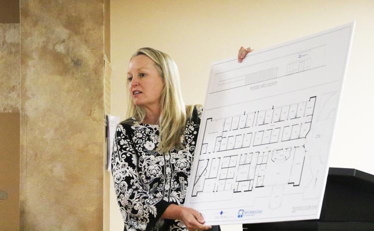 Palms Medical Group CEO Anita Rembert talks to the Lake Shore Hospital Authority board Monday about the floor plans for the Palms clinic on the Lake Shore campus. The facility would include 15 exam rooms and a pharmacy would be added in the second year it is open. (MORGAN MCMULLEN/Lake City Reporter)