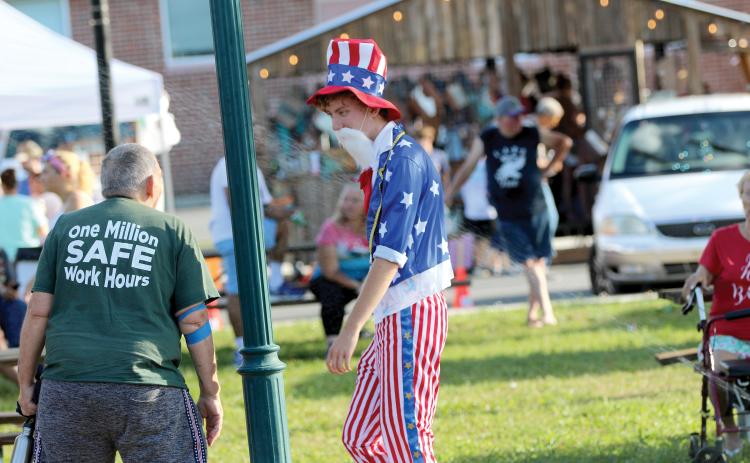Uncle Sam made at an appearance at a previous year’s Freedom Festival in downtown Live Oak. This year’s event is set to begin at 6:30 p.m. on July 4. Purple Heart recipients from Suwannee County will be recognized. (FILE)