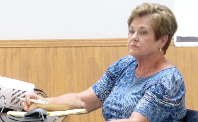 Connie Brecheen, listening at a Fort White town meeting, was selected as the White Springs interim manager Thursday. (FILE)