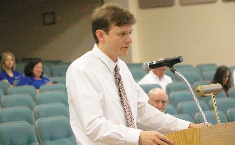 Staz Guntek, Columbia County’s legislative and intergovernmental affairs coordinator, updates the Columbia County Commission on the state budget talks Thursday. (JAMIE WACHTER/Lake City Reporter)