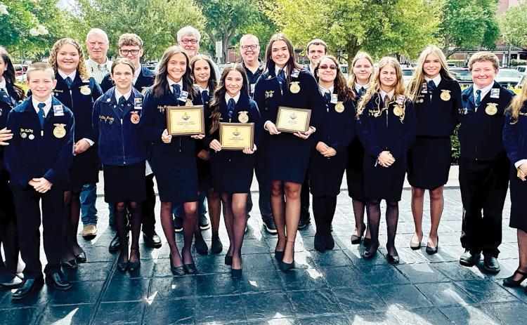 Fort White’s FFA chapter was named one of ‘Florida’s Finest’ as well as winning the ‘Premier Chapter’ and a Supervised Agricultural Experience Award at last week’s 97th Florida FFA State Convention in Orlando. (COURTESY)