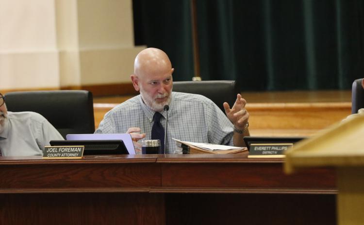 County Attorney Joel Foreman said the $565,789 settlement for the land acquisition was a good deal, noting eminent domain would wind up costing the county a lot more. (JAMIE WACHTER/Lake City Reporter)