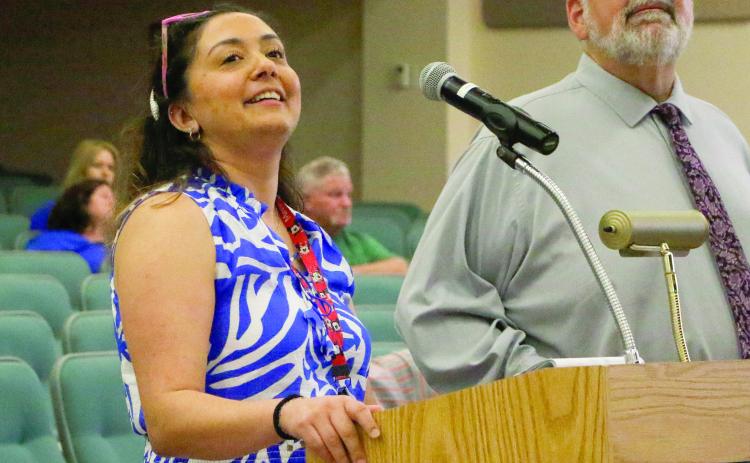 Diana Duque (left), the administrator of health for Columbia County, talks to the Columbia County Commission about proposed fee increases for services at the health department Thursday. (JAMIE WACHTER/Lake City Reporter)