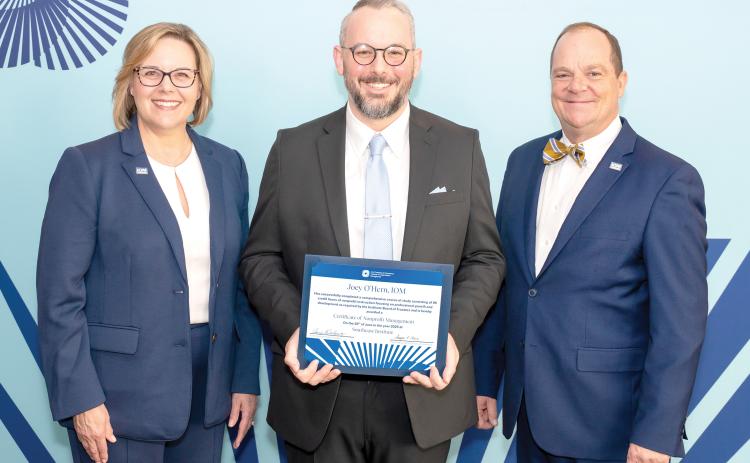 Lake City-Columbia County Chamber of Commerce Executive Director Joey O’Hern (middle) recently completed the Institute for Organization Management. (COURTESY)