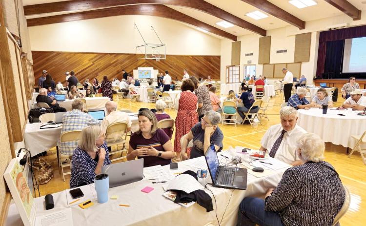 Attendees at a previous year’s Family History Fair at the Church of Jesus Christ of Latter-Day Saints’ Lake City Stake. The church is hosting the event again Saturday to help people learn about their genealogy. (COURTESY)