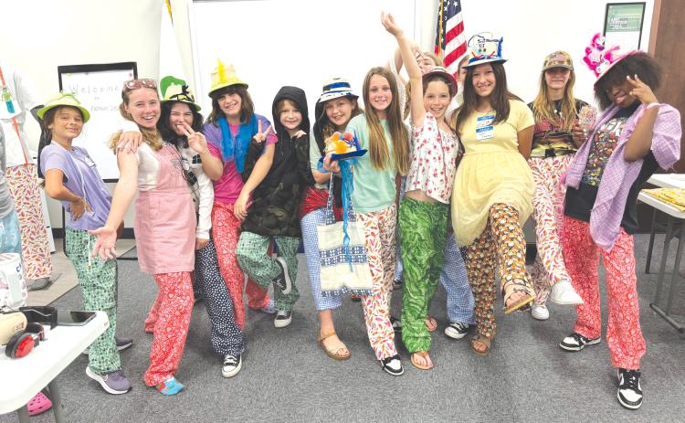 UF/IFAS 4-H Fashion Design campers show off their creations following a pair of days learning different sewing techniques. (COURTESY UF/IFAS EXTENSION)