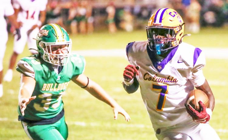Columbia receiver Kyren Caldwell turns up field after a catch against Suwannee on Friday. (BRENT KUYKENDALL/Lake City Reporter)