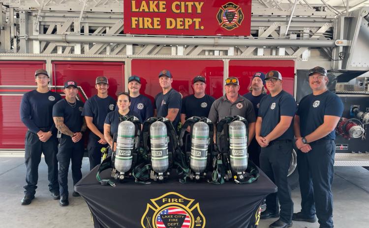 Lake City Fire Department firefighters Sam Watkins (from left), Angel Ovalle, Jerney Morgan, Christina Munro, Leon Jones, AJ Parnell, Trent Kreienheder, Stephen Coody, Elliot Redish, Gramby Croft and Matt Herdon stand with equipment that was recently donated as a result of the department getting a Firehouse Subs Public Safety Foundation grant. The total price for the equipment was $39,469. (COURTESY LAKE CITY FIRE DEPARTMENT)