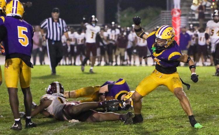 Columbia safety Julian De La Cruz celebrates after making a fourth-down stop to seal Friday’s win over Coffee. (BRENT KUYKENDALL/Lake City Reporter)