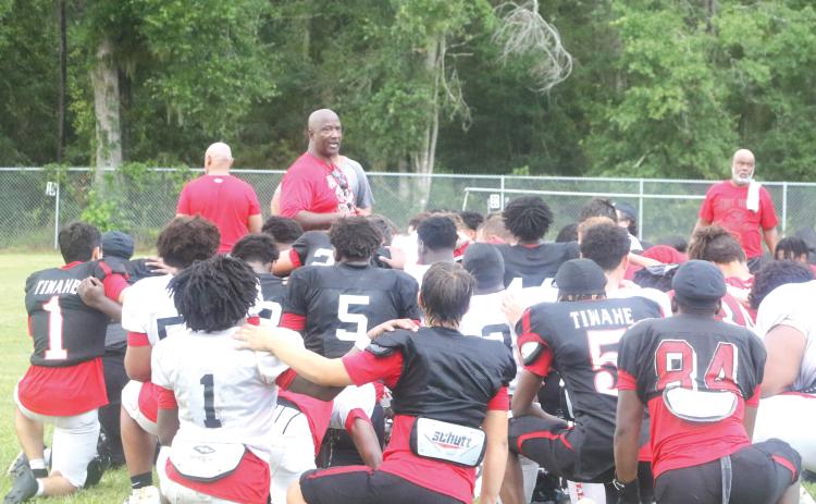 Fort White coach Demetric Jackson addresses his team after practice on Aug. 4. (MORGAN MCMULLEN/Lake City Reporter)