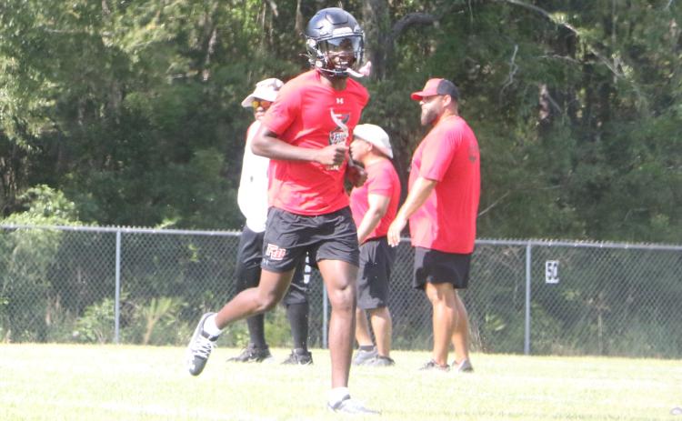 Fort White’s Jayden Jackson is all smiles ahead of Fort White’s first day of fall practice on July 28. (MORGAN MCMULLEN/Lake City Reporter)