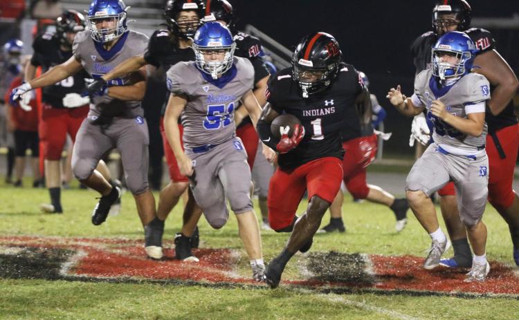 Fort White running back John’l Lawson breaks loose for a touchdown run against Belleview on Friday. (MORGAN MCMULLEN/Lake City Reporter)