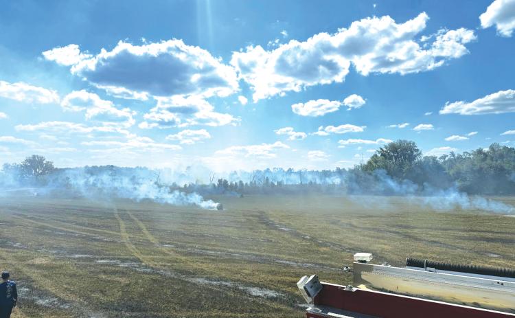 Columbia County Fire Rescue trucks battle a brush fire near NW Suwannee Valley Road and NW Cambridge Hill Way over the weekend. (COURTESY COLUMBIA COUNTY FIRE RESCUE)