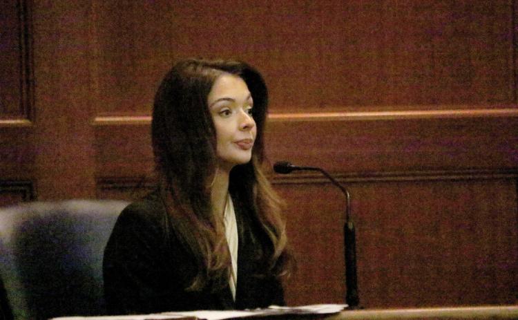 Miss United States Lindsey Langston, a Columbia County resident, sits on the witness stand in a hearing Friday morning at the Columbia County Courthouse. Langston is seeking an injunction for protection from stalking against U.S. Rep. Cory Mills, her former boyfriend. (TONY BRITT/Lake City Reporter)