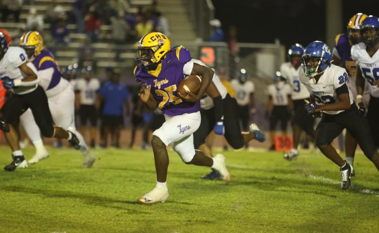 Columbia running back Jerome Horne breaks into the open field against Trinity Christian on Friday. (PAUL BUCHANAN/Lake City Reporter)