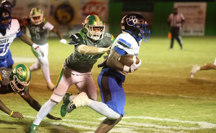 Suwannee defensive end Kyler Watson chases after a Godby ballcarrier during Friday's 36-31 loss. (PAUL BUCHANAN/Lake City Reporter)