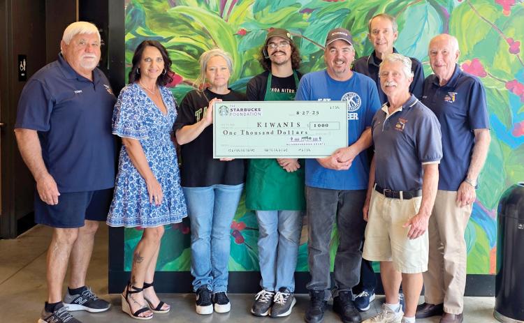 The Live Oak Kiwanis Club received a $1,000 grant from the Starbucks Foundation’s Neighborhood Grants program. Pictured are Tony Cameron (from left), Monja Slater, treasurer/past Lt. governor; Sara Sears, Starbucks manager; Tyler Neidlinger, Starbucks assistant manager; Jay Tull, Kiwanis president; Danny Hales, Joe Flanagan and Stan Storey. (COURTESY)